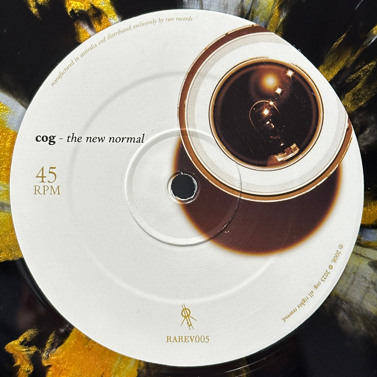 Cog New Normal Black & Silver Smash With Gold Splatter Variant