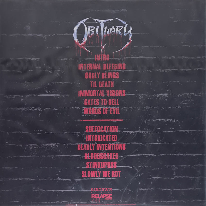 Slowly We Rot - Live & Rotting